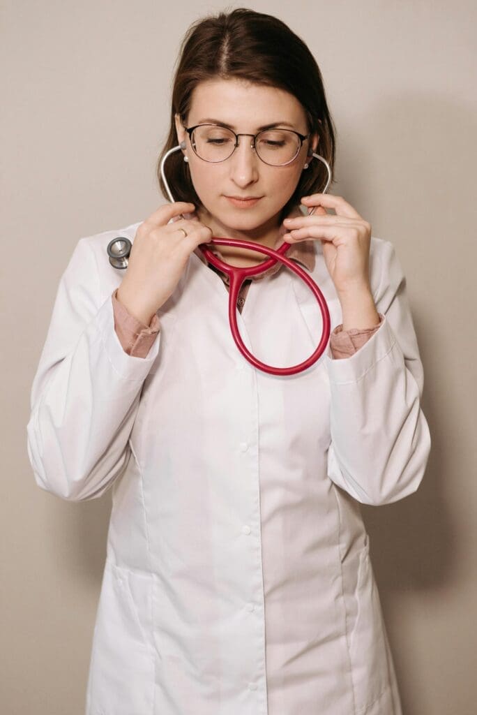 Medical professional wearing a stethoscope providing compassionate care at youth inc reno clinic
