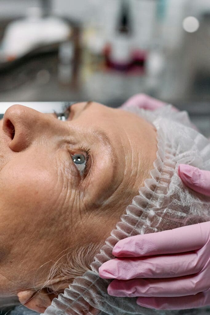 Woman receiving anti aging treatment at an anti aging clinic near me for personalized wellness care